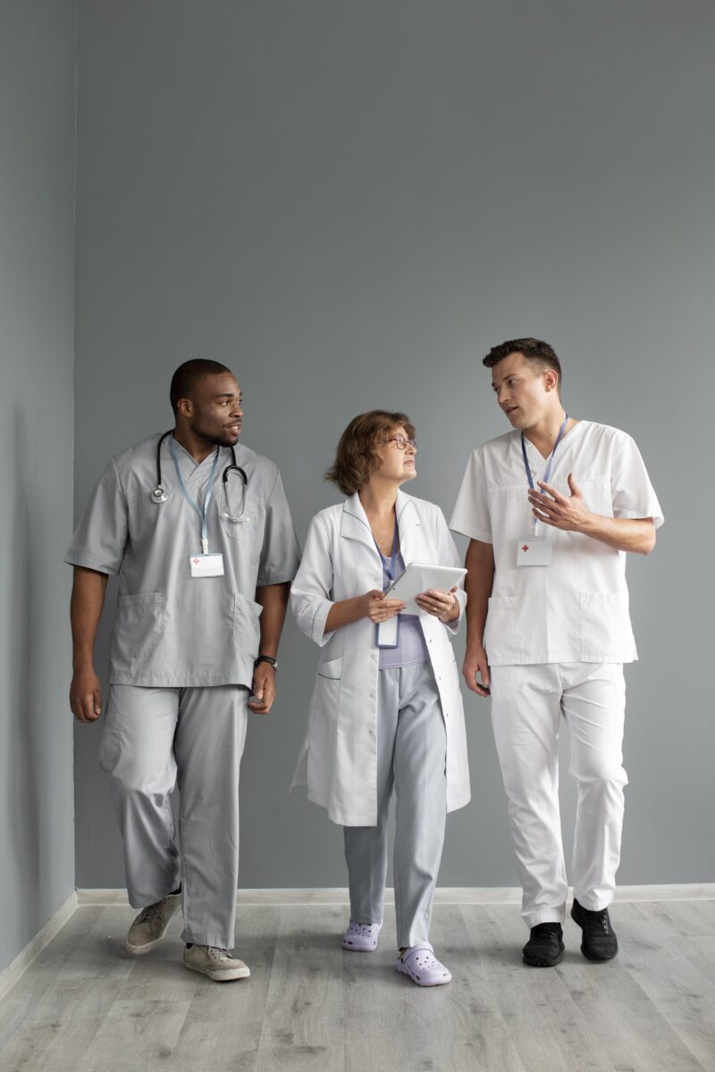 Healthcare professionals discussing patient care – the highest paying health careers in the medical industry