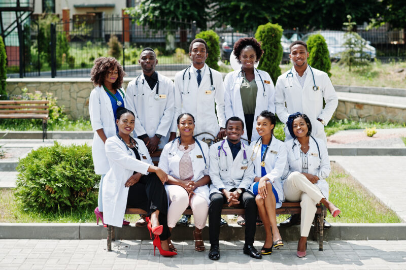 Public health scholarships for international students featuring diverse healthcare students at a university campus