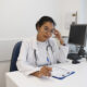Healthcare professional working at a medical desk, representing entry-level healthcare jobs no experience opportunities