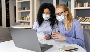 healthcare professionals studying online health certifications on a laptop to advance their healthcare career.