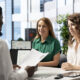 Recruiters reviewing an ATS Healthcare Resume during a healthcare job interview.