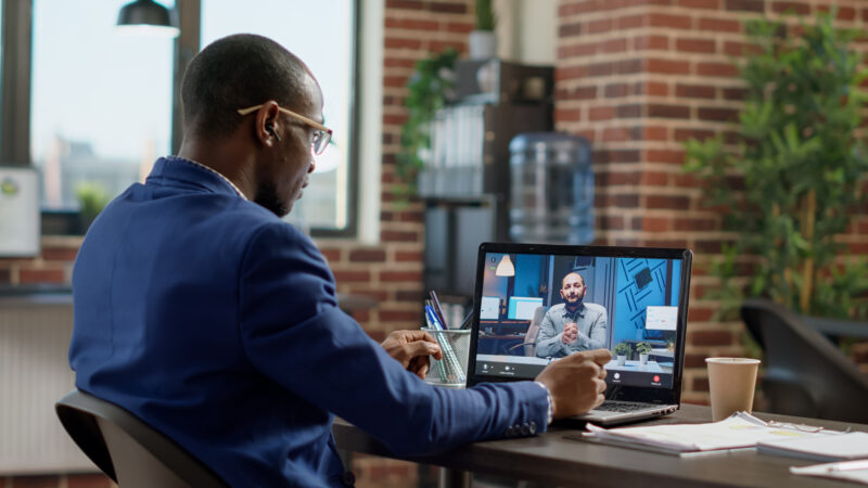 Recruiter conducting a virtual job interview with a candidate over a video call