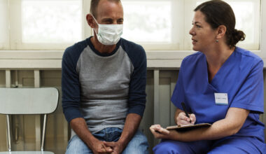 First healthcare job guide showing a new healthcare professional assisting a patient in a hospital