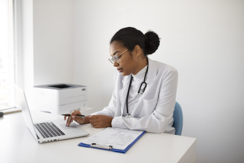 A healthcare professional writing a Healthcare Cover Letter for a job application