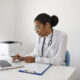 A healthcare professional writing a Healthcare Cover Letter for a job application